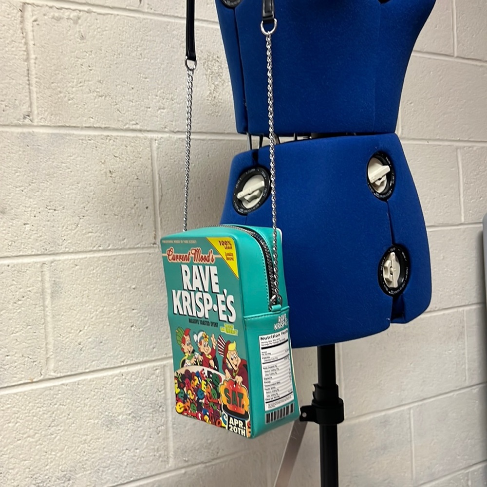 Unhinged cross body bag